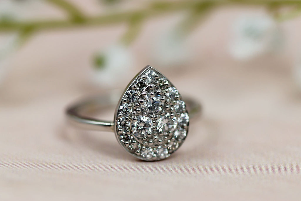 pear shaped diamond cluster halo dress ring