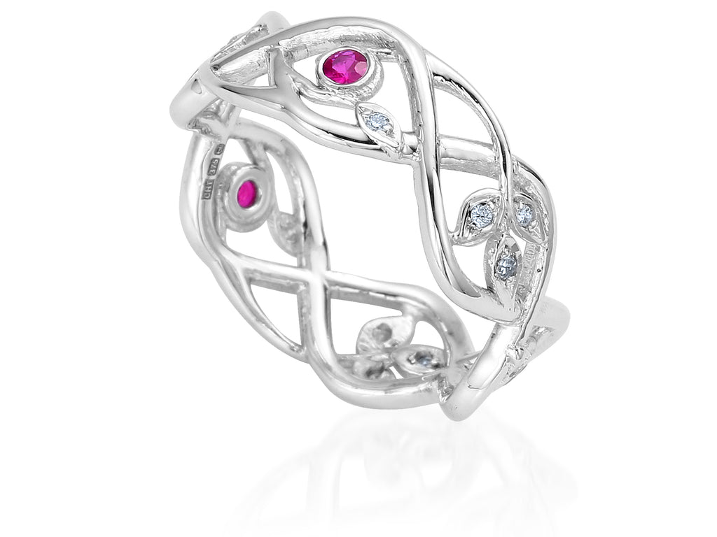 Wide white gold entwined organic style wedding ring with tendrils, leaves, rubies and white diamonds