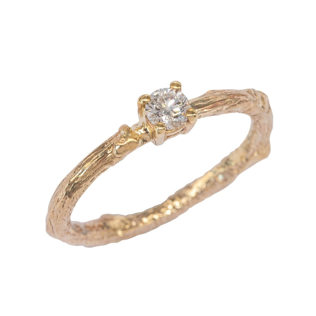 Gold twig textured ring with white diamond