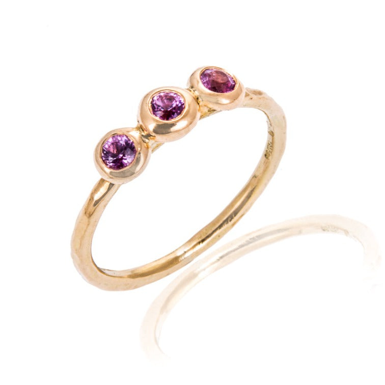 Slim 18ct gold ring with 3 pink sapphires