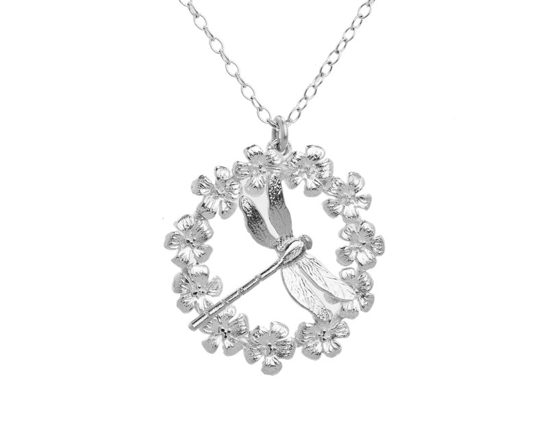 silver flower wreath and dragonfly necklace
