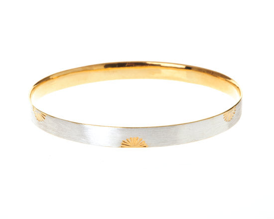 oval silver bangle with gold sunrises