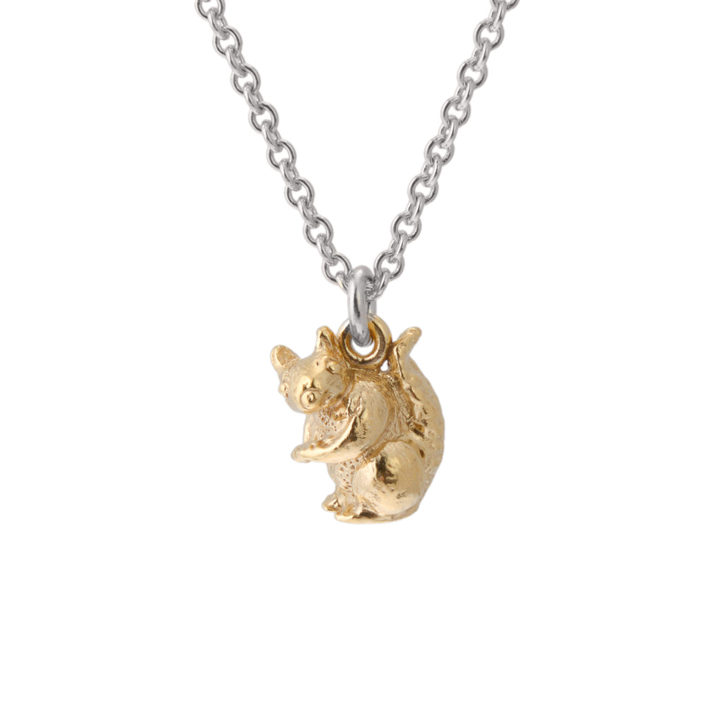 Gold squirrel pendant on silver chain