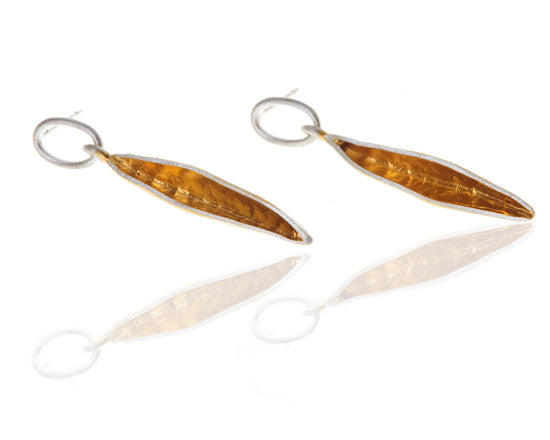 silver and gold leaf earrings on round drop
