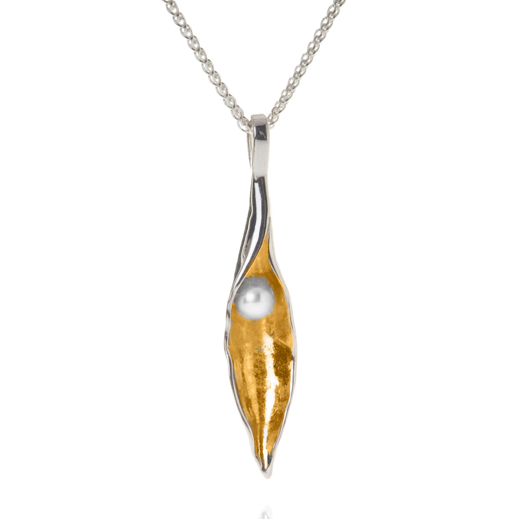 Medium silver pod pendant with gold plate inside and white pearl, on silver chain