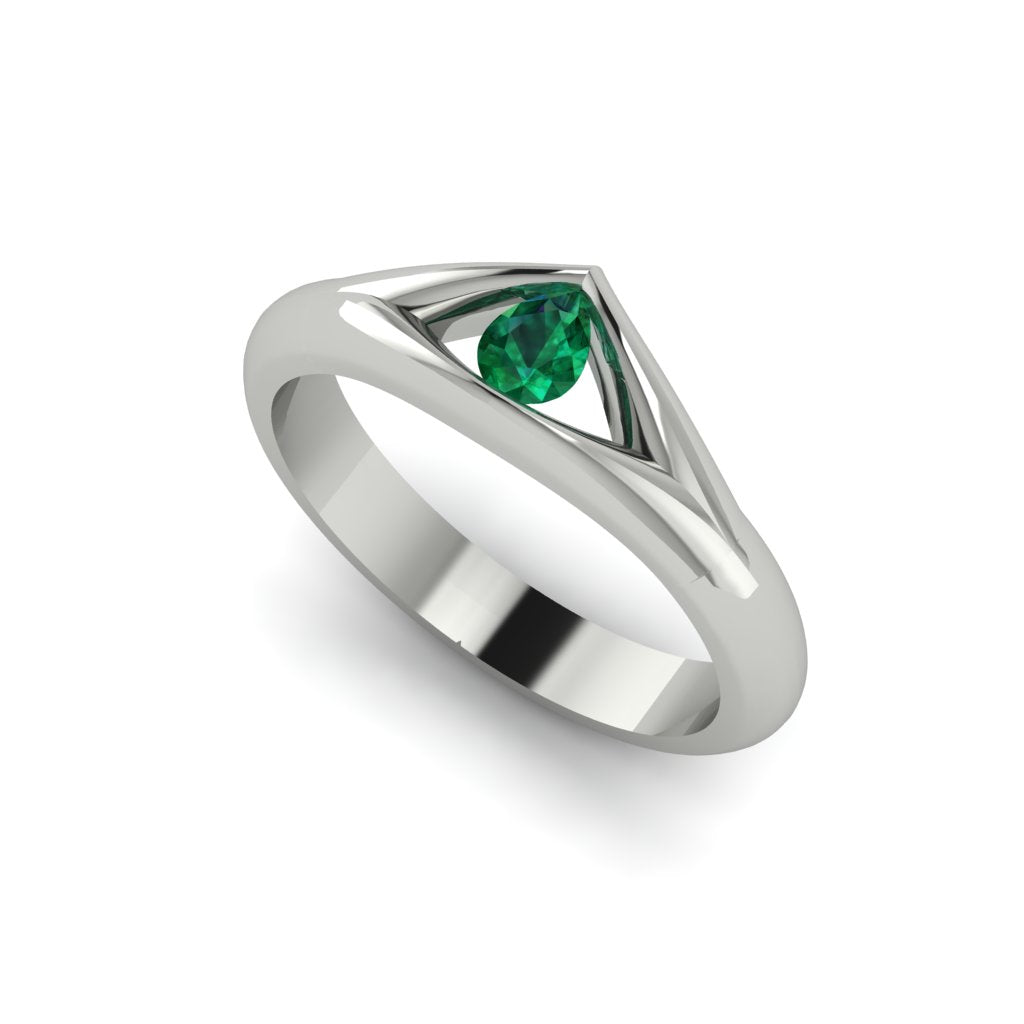 18ct white gold engagement ring with triangular peak at the front and pear shaped emerald