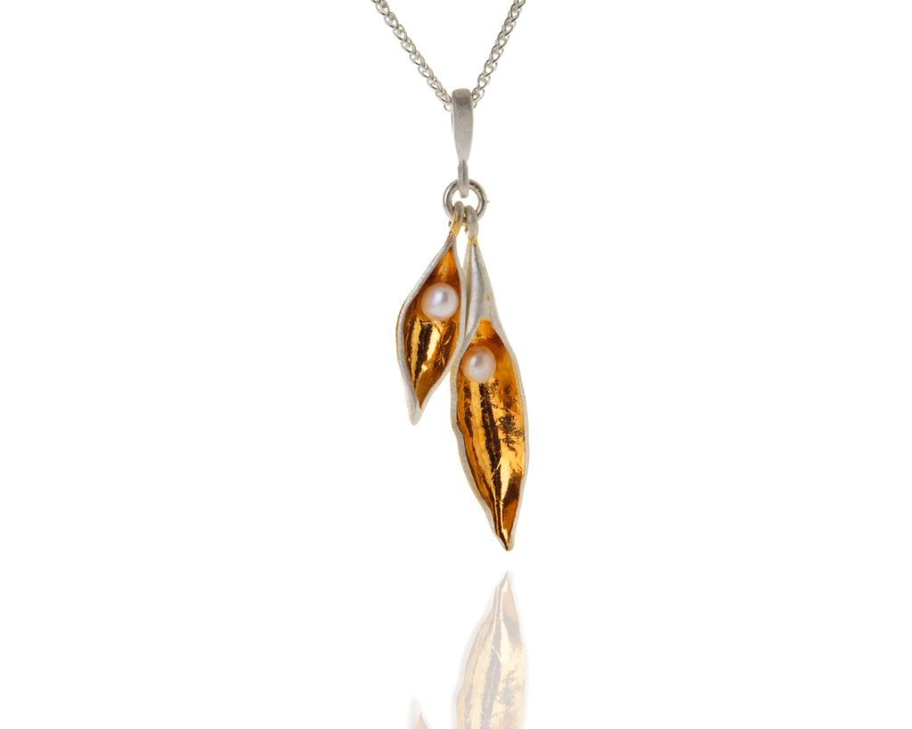 small and medium pea pod necklace with gold plate and white pearl
