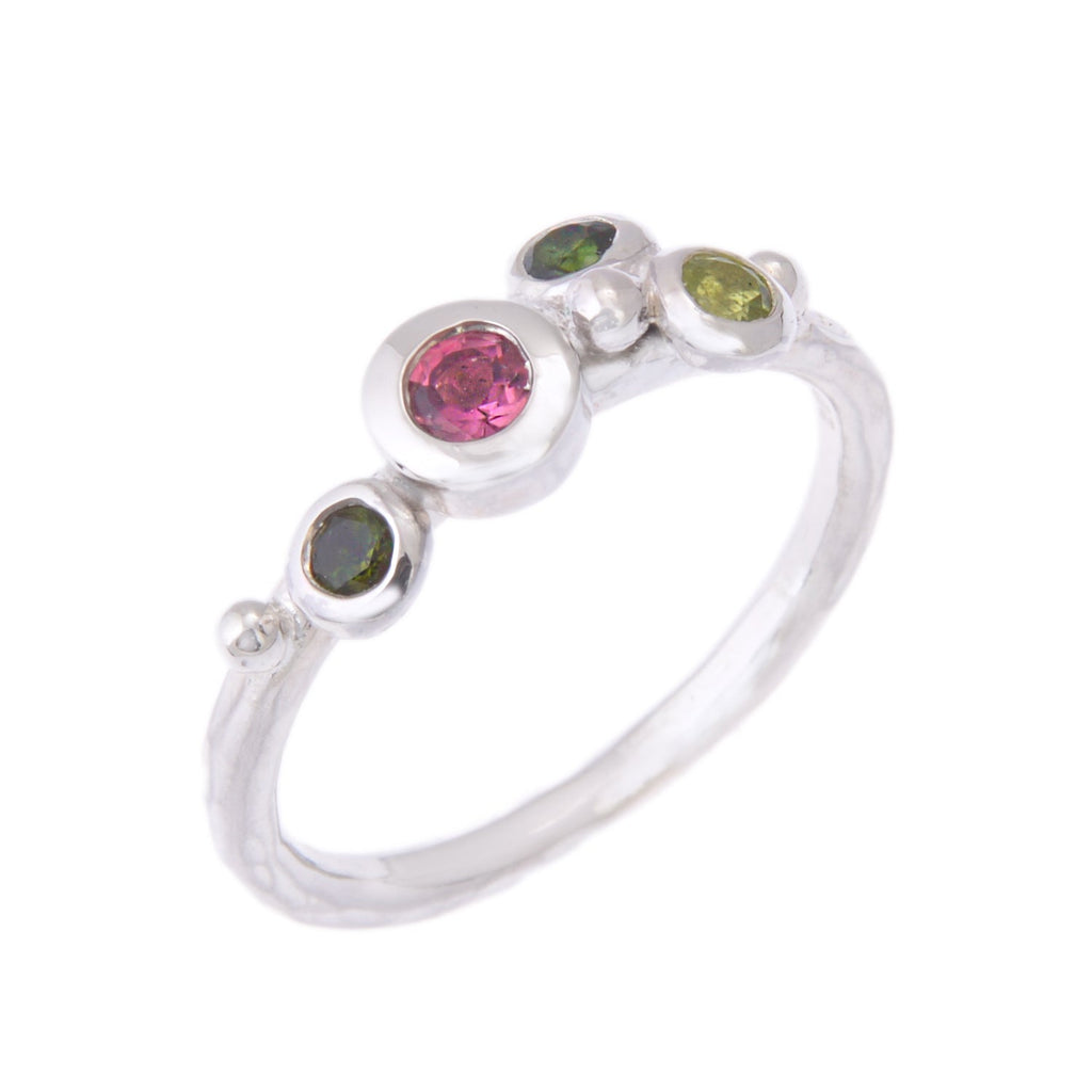 Silver ring with round shank and pink and green gemstones