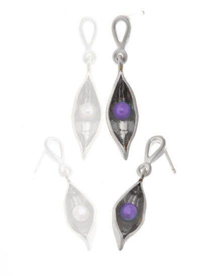 Small silver pods with a purpley black pearl inside, hanging from a silver stud earring 