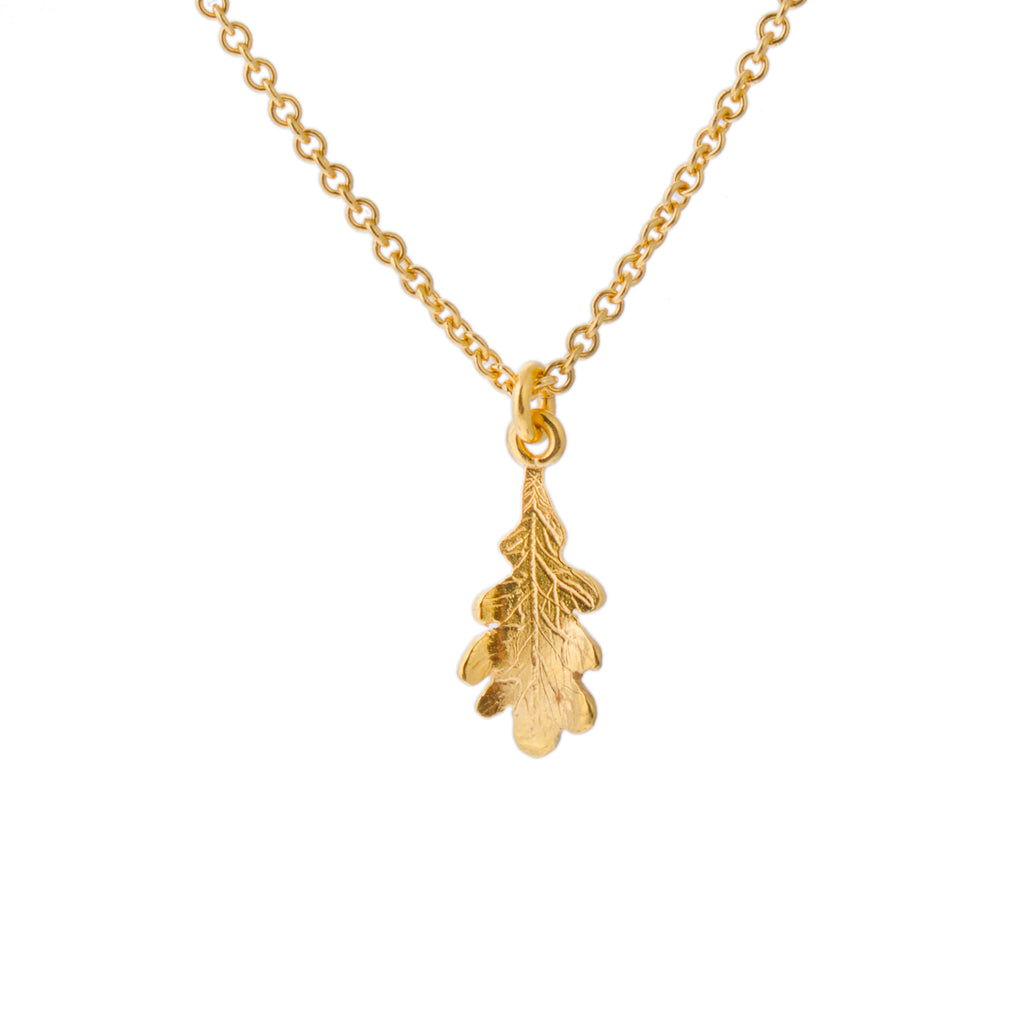 Gold necklace with tiny oak leaf pendant