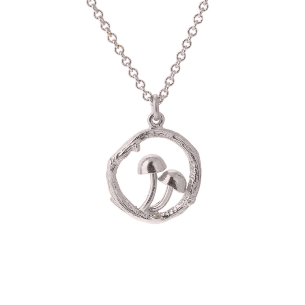 Silver circular pendant with 2 tiny mushrooms inside on silver chain