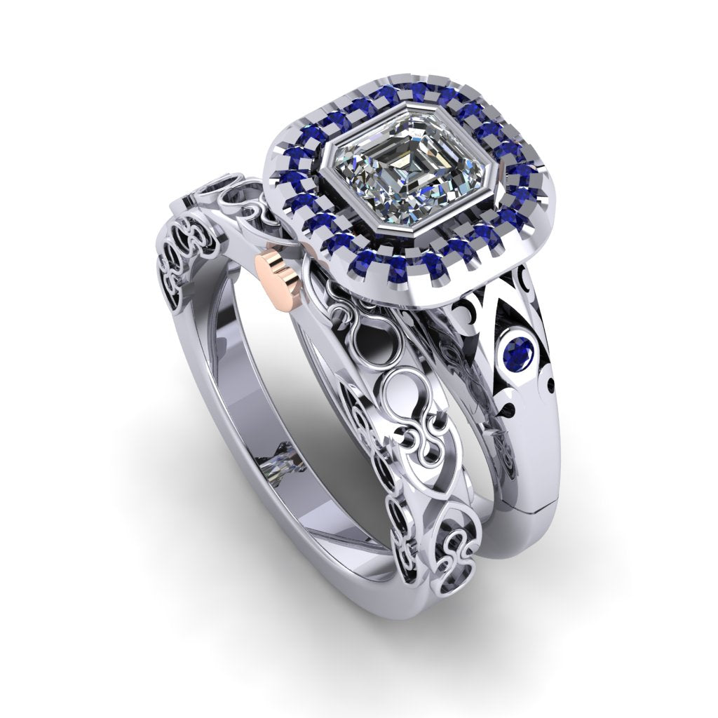 A heavily patterned platinum Celtic design wedding ring standing on end next to an engagement ring with a large square head