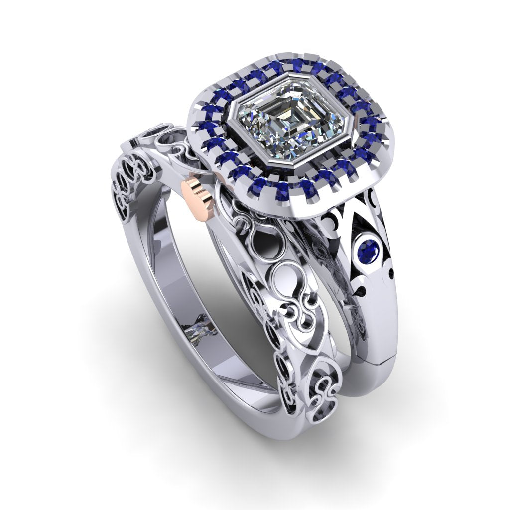 A heavily patterned platinum Celtic design wedding ring standing on end next to an engagement ring with a large square head