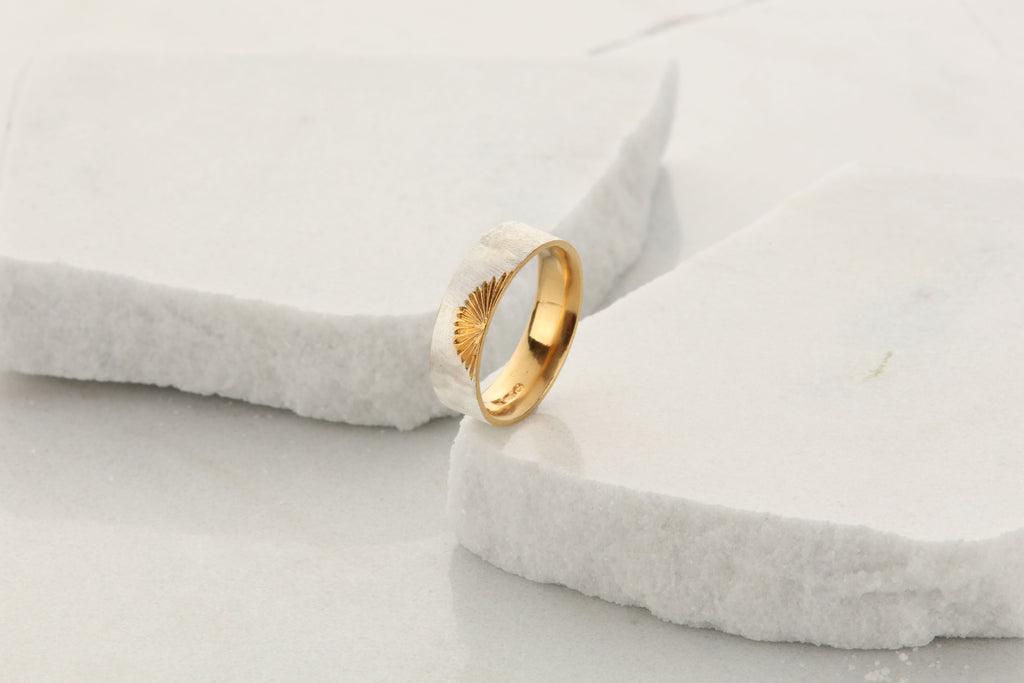 6mm wide matt silver ring with gold sunrise