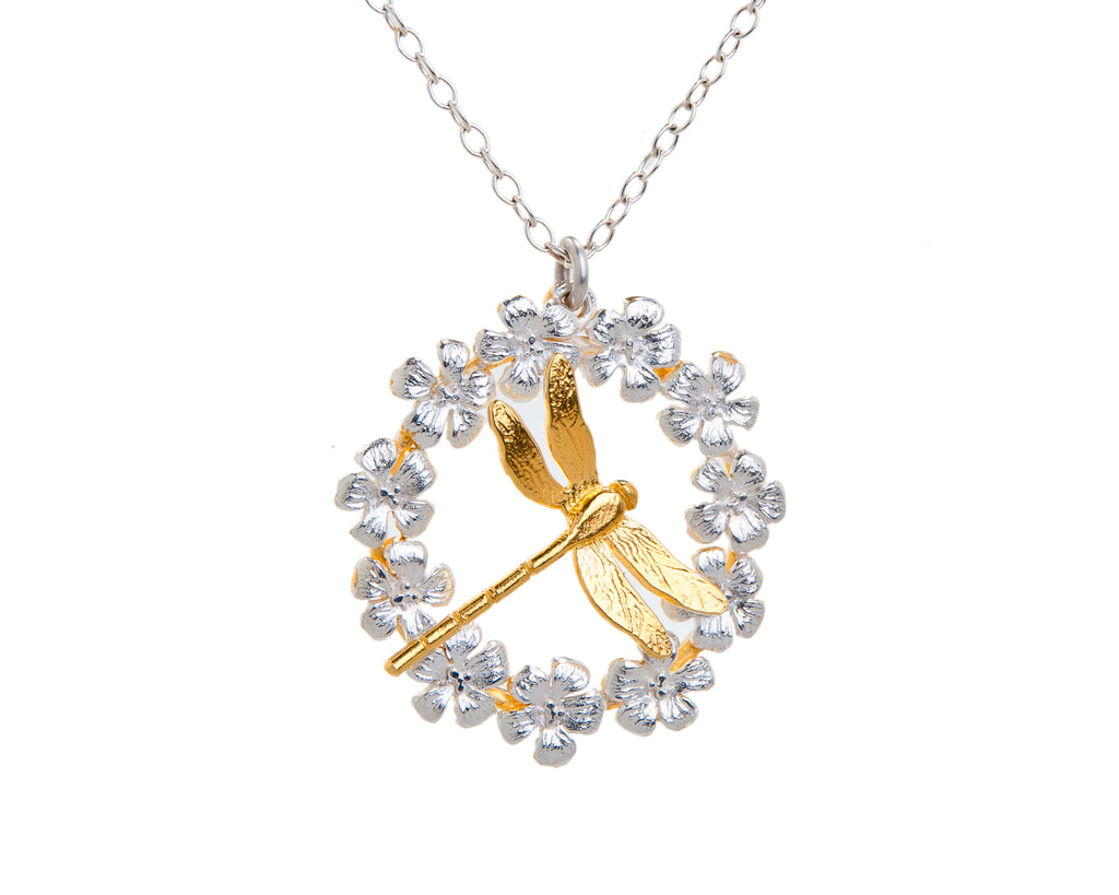 silver flower necklace with gold dragonfly