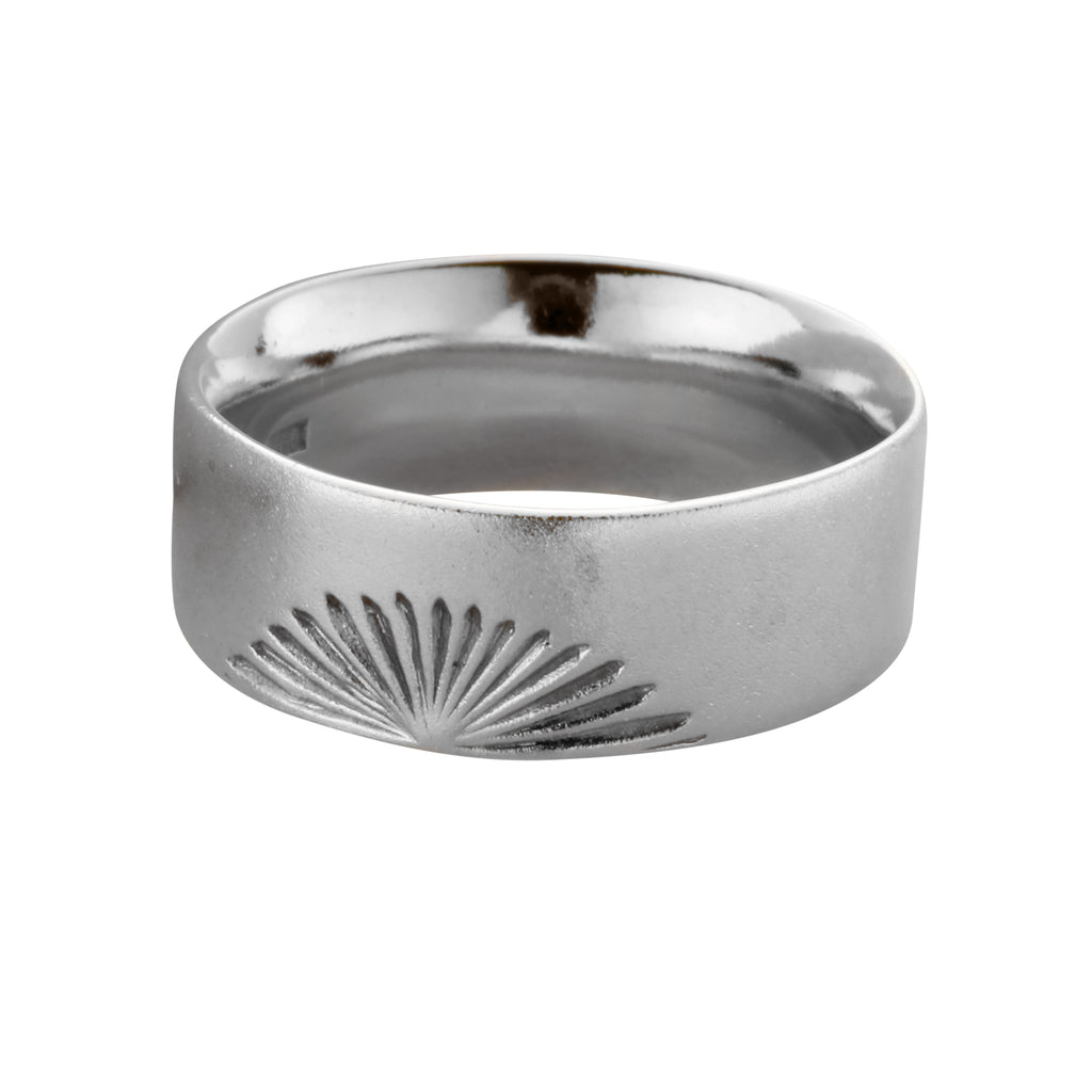 white gold man's wedding ring with sun design and matt finish