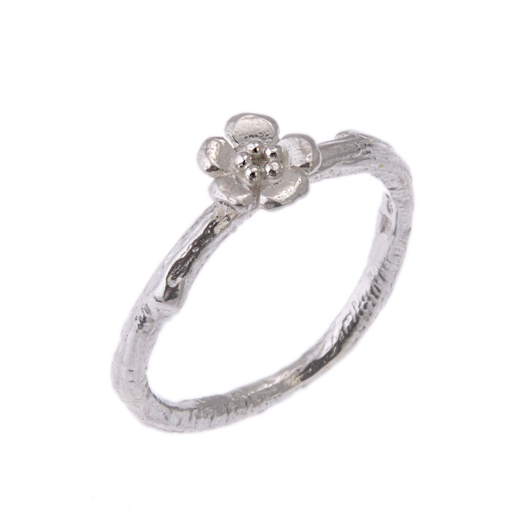 Silver twig ring with silver flower