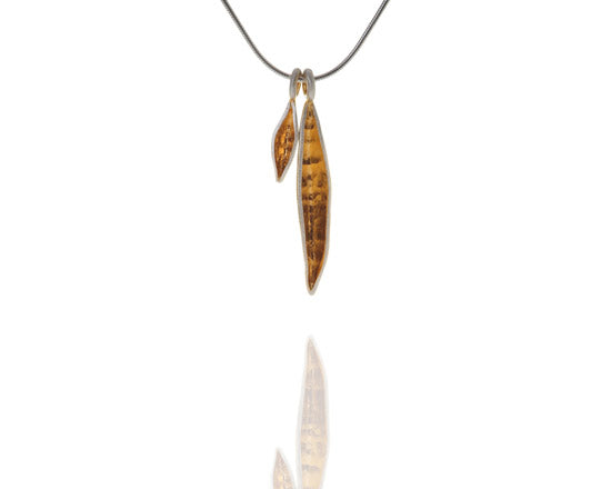 Small and large gold pod pendant on chain