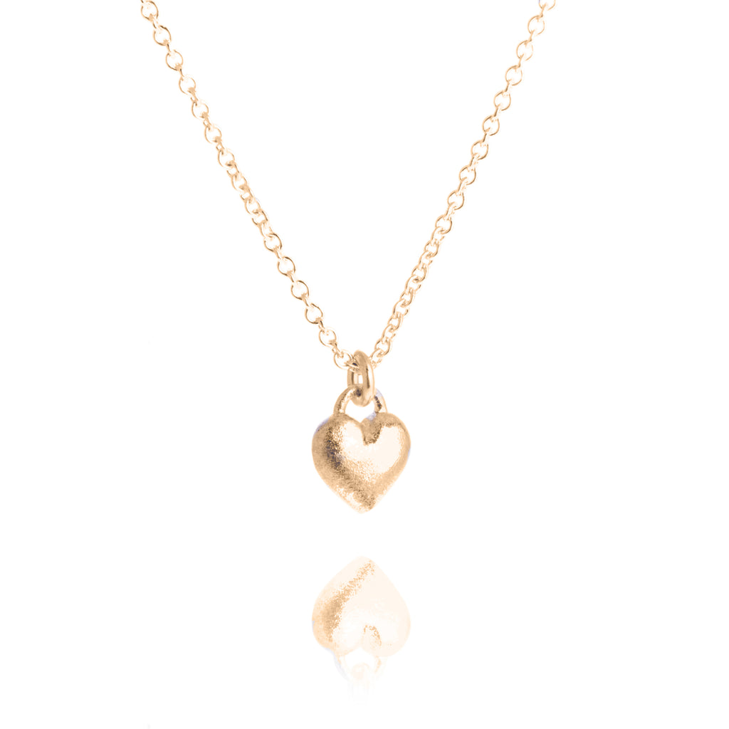 small rounded gold-plated heart pendant on gold-plated trace chain