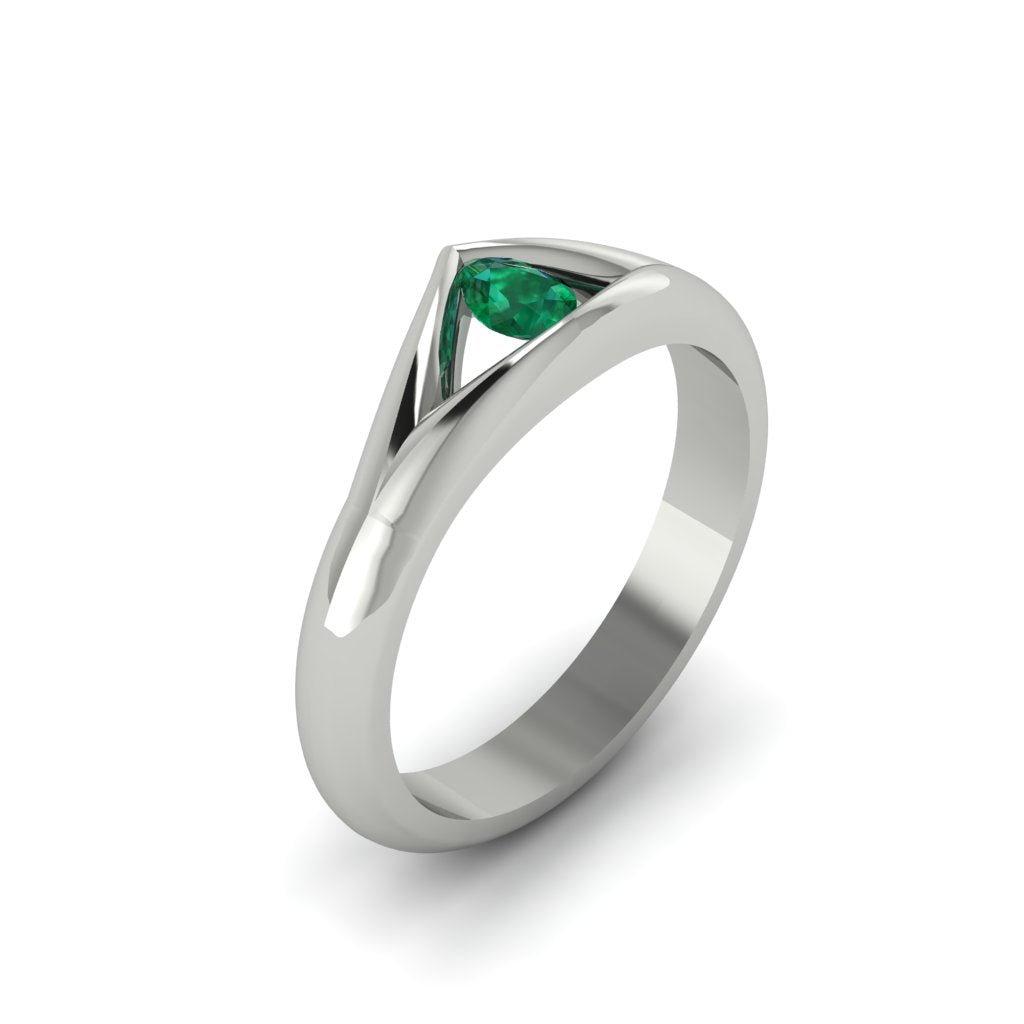pear shaped emerald engagement ring in white gold