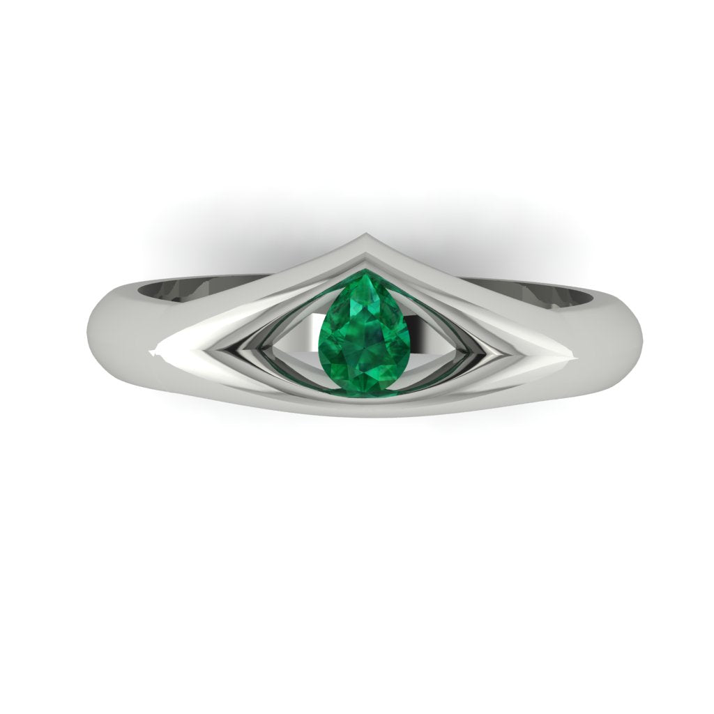 18ct white gold ring with a mountain style peak to the front. The ring has a cut out at the front where a pear shaped emerald is set