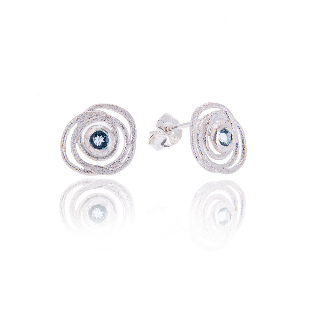 circular silver earrings with aquamarine