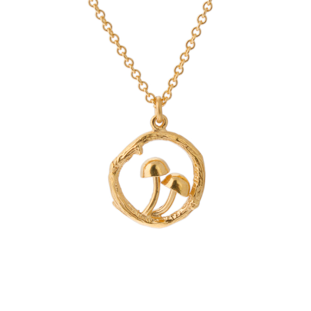 Circular gold pendant with 2 tiny mushrooms on gold chain