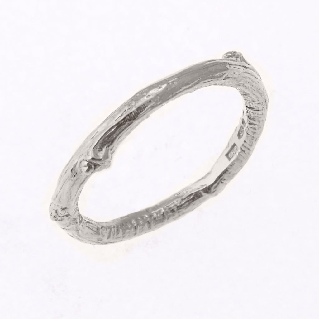 Silver ring with twig texture