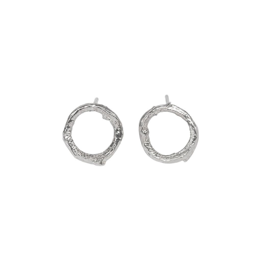 Silver circle stud earrings with twig texture